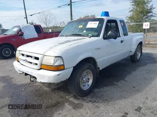 1999 Ford Ranger XLT with VIN 1FTYR14X1XTA56091, listed as a IAAI auction lot 41437904 with 187,149 mi miles and . Bid and sale history available at DreamBid. Image 2.