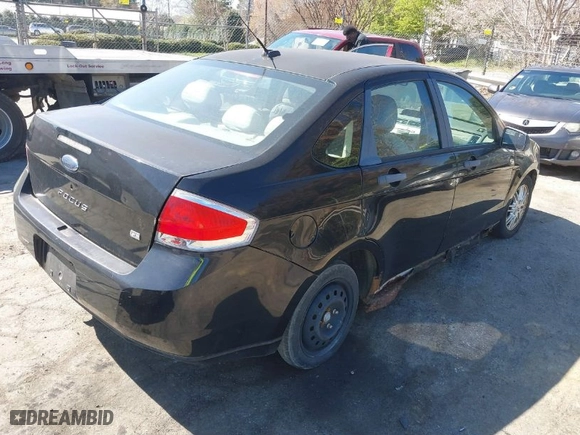 2009 Ford Focus SE with VIN 1FAHP35N09W158407, listed as a IAAI auction lot 41867919 with 174,901 mi miles. Bid and sale history available at carsss.com. Image 4.