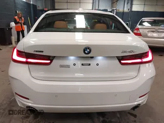 2023 BMW 3 Series 330e xDrive with VIN 3MW39FS05P8D20575, listed as a IAAI auction lot 42076033 with 10,875 mi miles. Bid and sale history available at carsss.com. Image 16.