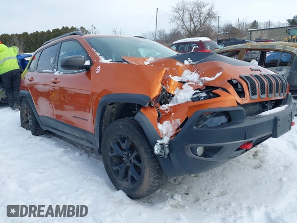 2015 Jeep Cherokee Trailhawk with VIN 1C4PJMBS9FW655233, listed as a IAAI auction lot 41430715 with 138,181 mi miles and . Bid and sale history available at carsss.com. Image 1.