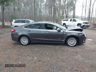 2016 Ford Fusion SE Hybrid with VIN 3FA6P0LU2GR388787, listed as a IAAI auction lot 41733661 with 86,078 mi miles and . Bid and sale history available at DreamBid. Image 13.