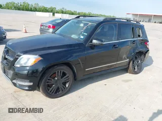 2013 Mercedes-Benz GLK with VIN WDCGG5HB2DF990806, listed as a IAAI auction lot 42047198 with 130,728 mi miles. Bid and sale history available at carsss.com. Image 2.