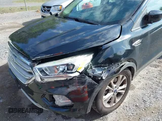 2017 Ford Escape SE with VIN 1FMCU9G91HUB56073, listed as a IAAI auction lot 42130463 with 94,275 mi miles and . Bid and sale history available at carsss.com. Image 6.