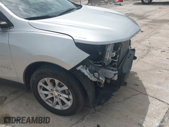 2021 Chevrolet Equinox LT z VIN 3GNAXKEV0MS165682, wystawiony jako IAAI lot #42419436 z przebiegiem 42 199 mil mil oraz . Historia ofert i sprzedaży dostępna na DreamBid. Obrazek 18.