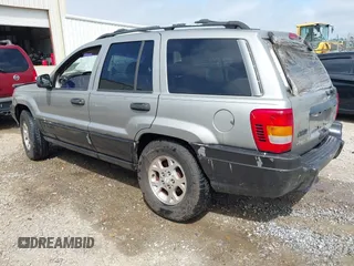 2000 Jeep Grand Cherokee Laredo с VIN 1J4G248S5YC299897, выставлен на аукционе IAAI как лот 41944724 с пробегом Не указан миль и . История ставок и продаж доступна на DreamBid. Изображение 3.