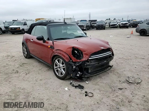 2012 MINI Convertible z VIN WMWZN3C59CT135172, wystawiony jako Copart lot #45593815 z przebiegiem 154 477 mil mil oraz Szkoda całkowita • Salvage title. Historia ofert i sprzedaży dostępna na DreamBid. Obrazek 11.