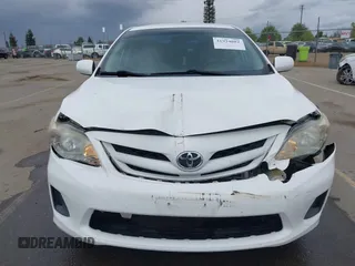 2011 Toyota Corolla L with VIN 2T1BU4EE6BC638383, listed as a IAAI auction lot 41934082 with 130,889 mi miles. Bid and sale history available at carsss.com. Image 12.