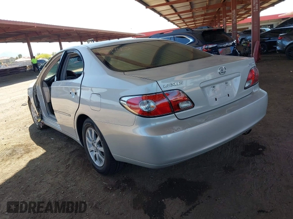 2002 Lexus ES 300 z VIN JTHBF30G220077671, wystawiony jako IAAI lot #42084128 z przebiegiem 143 975 mil mil oraz . Historia ofert i sprzedaży dostępna na DreamBid. Obrazek 3.