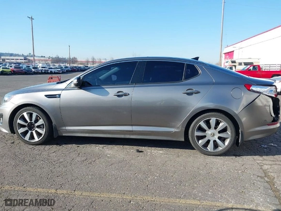 2013 Kia Optima SX w/Limited Pkg with VIN 5XXGR4A69DG190125, listed as a IAAI auction lot 41424498 with 134,056 mi miles. Bid and sale history available at carsss.com. Image 14.