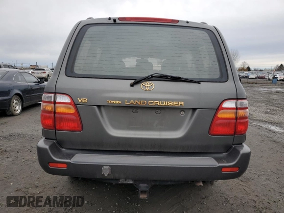 2000 Toyota Land Cruiser with VIN JT3HT05J5Y0114569, listed as a Copart auction lot 86542484 with 256,816 mi miles and Salvage Title. Bid and sale history available at carsss.com. Image 6.