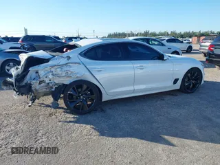 2023 Genesis G70 2.0T z VIN KMTG34TA9PU110258, wystawiony jako IAAI lot #40985797 z przebiegiem 23 422 mil mil oraz . Historia ofert i sprzedaży dostępna na DreamBid. Obrazek 4.
