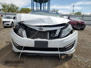 2013 Kia Optima SX z VIN 5XXGR4A61DG152999, wystawiony jako Copart lot #55852445 z przebiegiem 124 825 mil mil oraz Szkoda całkowita • Salvage title. Historia ofert i sprzedaży dostępna na DreamBid. Obrazek 5.