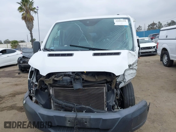 2017 Ford Transit XL with VIN 1FBZX2ZM2HKA60922, listed as a IAAI auction lot 41895331 with Not Provided miles and . Bid and sale history available at DreamBid. Image 12.