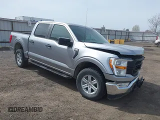 2021 Ford F-150 XL z VIN 1FTFW1E5XMFA28555, wystawiony jako IAAI lot #41814344 z przebiegiem 31 680 mil mil oraz . Historia ofert i sprzedaży dostępna na DreamBid. Obrazek 1.