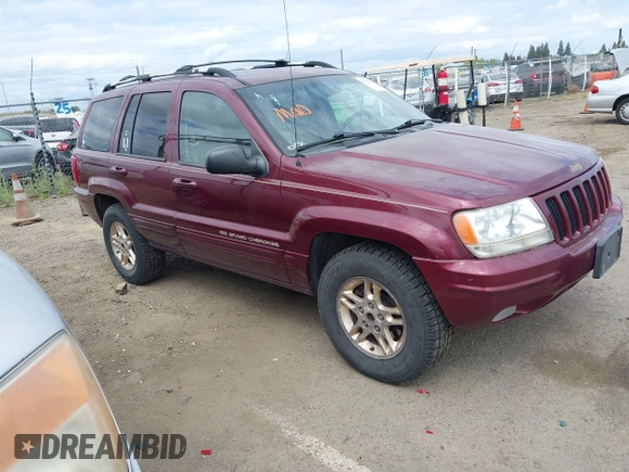 1999 Jeep Grand Cherokee Limited with VIN 1J4GW68N3XC696825, listed as a IAAI auction lot 42117857 with 236,300 mi miles. Bid and sale history available at carsss.com. Image 1.