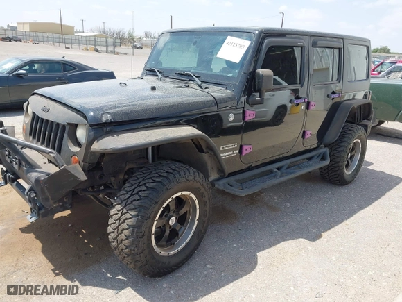 2013 Jeep Wrangler Unlimited Sport with VIN 1C4BJWDG9DL569109, listed as a IAAI auction lot 42115703 with 120,803 mi miles. Bid and sale history available at carsss.com. Image 17.