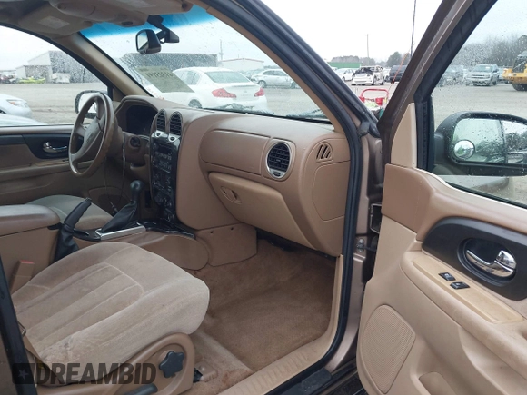 2003 GMC Envoy SLE with VIN 1GKDT13S332264984, listed as a IAAI auction lot 41523191 with 227,004 mi miles. Bid and sale history available at carsss.com. Image 5.