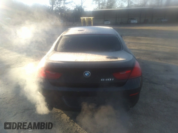 2014 BMW 6 Series 640i z VIN WBA6A0C55EDZ04549, wystawiony jako IAAI lot #41764155 z przebiegiem 154 705 mil mil oraz . Historia ofert i sprzedaży dostępna na DreamBid. Obrazek 16.