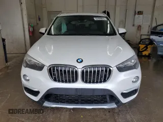 2018 BMW X1 xDrive28i с VIN WBXHT3C32J5K32348, выставлен на аукционе Copart как лот 53489825 с пробегом 61 972 миль миль и Списание • Salvage title. История ставок и продаж доступна на DreamBid. Изображение 5.
