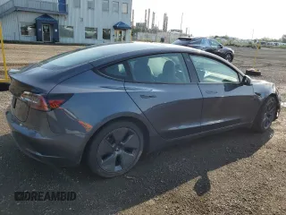 2023 Tesla Model 3 with VIN 5YJ3E1EA8PF692428, listed as a Copart auction lot 64667414 with 16,704 mi miles and Salvage Title. Bid and sale history available at DreamBid. Image 3.