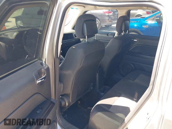 2014 Jeep Patriot Sport z VIN 1C4NJPBB7ED509853, wystawiony jako IAAI lot #42307976 z przebiegiem 150 271 mil mil oraz . Historia ofert i sprzedaży dostępna na DreamBid. Obrazek 14.