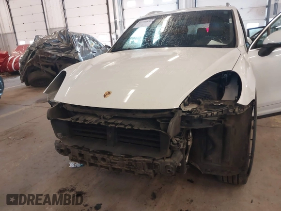 2016 Porsche Cayenne with VIN WP1AA2A26GLA10357, listed as a IAAI auction lot 41370956 with 96,026 mi miles. Bid and sale history available at carsss.com. Image 6.