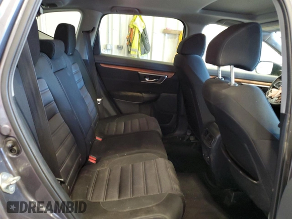2020 Honda CR-V EX z VIN 5J6RW2H55LL000770, wystawiony jako Copart lot #56879865 z przebiegiem 141 688 mil mil oraz Szkoda całkowita • Salvage title. Historia ofert i sprzedaży dostępna na DreamBid. Obrazek 11.