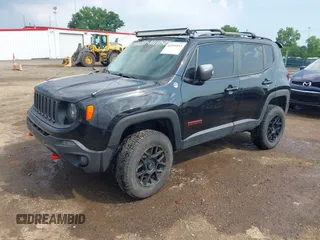 2015 Jeep Renegade Trailhawk z VIN ZACCJBCT9FPB36609, wystawiony jako IAAI lot #42593933 z przebiegiem 106 074 mil mil oraz . Historia ofert i sprzedaży dostępna na DreamBid. Obrazek 2.