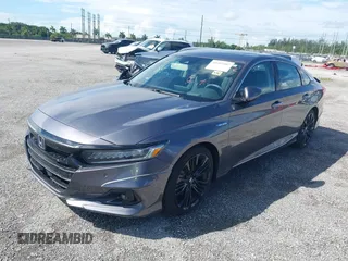 2022 Honda Accord Touring with VIN 1HGCV3F91NA031010, listed as a IAAI auction lot 40302407 with 18,820 mi miles and . Bid and sale history available at DreamBid. Image 2.