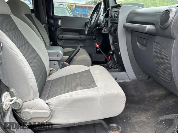 2008 Jeep Wrangler X with VIN 1J4FA24168L582227, listed as a Copart auction lot 58219065 with 98,284 mi miles and Salvage title. Bid and sale history available at DreamBid. Image 5.
