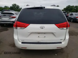 2011 Toyota Sienna XLE AAS with VIN 5TDYK3DCXBS063948, listed as a Copart auction lot 59776695 with 305,799 mi miles and Salvage title. Bid and sale history available at DreamBid. Image 6.