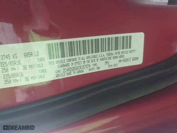 2012 Dodge Grand Caravan SE with VIN 2C4RDGBG0CR157374, listed as a IAAI auction lot 40502846 with 112,079 mi miles. Bid and sale history available at carsss.com. Image 9.