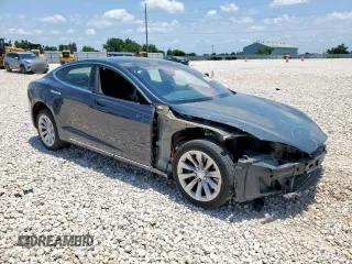 2017 Tesla Model S 60 with VIN 5YJSA1E15HF223354, listed as a Copart auction lot 60064725 with 60,403 mi miles and Salvage title. Bid and sale history available at DreamBid. Image 4.
