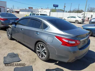 2016 Nissan Altima SR with VIN 1N4AL3AP1GC285363, listed as a IAAI auction lot 41754598 with 121,923 mi miles and . Bid and sale history available at carsss.com. Image 3.