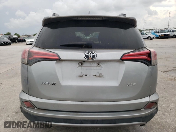 2018 Toyota RAV4 XLE with VIN 2T3WFREV2JW446388, listed as a Copart auction lot 54000675 with Not Provided miles and Salvage Title. Bid and sale history available at DreamBid. Image 6.