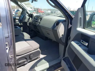 2004 Ford F-150 XLT with VIN 1FTRW14W24KA27415, listed as a IAAI auction lot 42081888 with 149,897 mi miles. Bid and sale history available at carsss.com. Image 5.