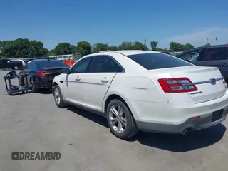 2013 Ford Taurus SEL with VIN 1FAHP2E83DG212029, listed as a IAAI auction lot 42020548 with 172,887 mi miles. Bid and sale history available at carsss.com. Image 14.