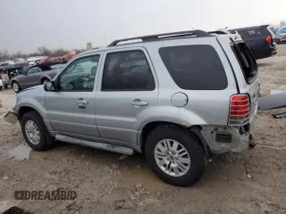 2005 Mercury Mariner Luxury z VIN 4M2CU57105DJ33266, wystawiony jako Copart lot #87002044 z przebiegiem 164 313 mil mil oraz Szkody całkowita. Historia ofert i sprzedaży dostępna na DreamBid. Obrazek 2.