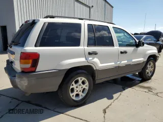 2003 Jeep Grand Cherokee Laredo with VIN 1J4GW48S83C517330, listed as a Copart auction lot 52765415 with 108,920 mi miles and Salvage title. Bid and sale history available at DreamBid. Image 3.