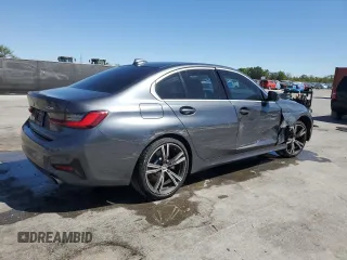 2021 BMW 3 Series 330i with VIN 3MW5R1J08M8B68719, listed as a Copart auction lot 49869565 with 41,200 mi miles and Salvage Title. Bid and sale history available at carsss.com. Image 3.