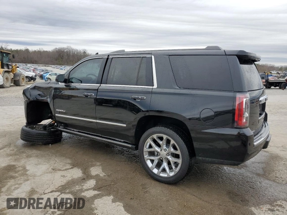 2018 GMC Yukon Denali with VIN 1GKS2CKJ9JR121234, listed as a Copart auction lot 44348605 with 116,731 mi miles and Salvage Title. Bid and sale history available at carsss.com. Image 2.