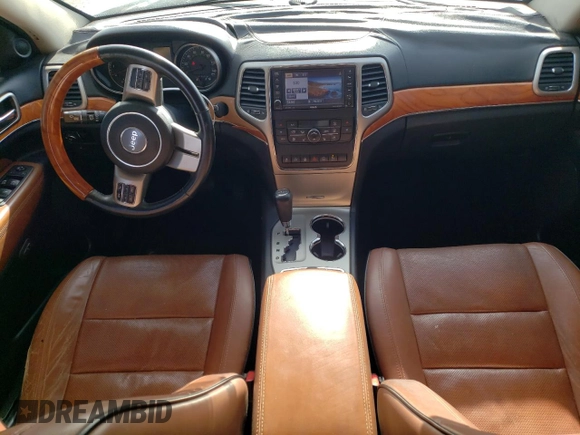 2013 Jeep Grand Cherokee Overland with VIN 1C4RJFCT2DC650336, listed as a Copart auction lot 83830304 with 129,858 mi miles and Clean Title. Bid and sale history available at carsss.com. Image 8.