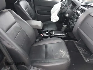 2009 Ford Escape Limited z VIN 1FMCU04779KB54792, wystawiony jako IAAI lot #42629083 z przebiegiem 148 350 mil mil oraz . Historia ofert i sprzedaży dostępna na DreamBid. Obrazek 5.