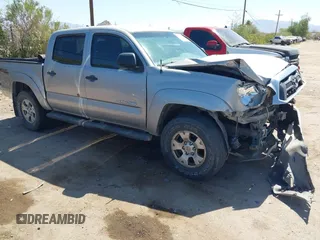 2015 Toyota Tacoma with VIN 3TMLU4EN6FM188736, listed as a IAAI auction lot 42605859 with 210,717 mi miles and . Bid and sale history available at DreamBid. Image 1.