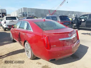 2014 Cadillac XTS Luxury with VIN 2G61M5S38E9326187, listed as a IAAI auction lot 42623068 with 169,102 mi miles and . Bid and sale history available at DreamBid. Image 3.