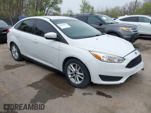 2016 Ford Focus SE with VIN 1FADP3F2XGL324613, listed as a IAAI auction lot 41971597 with 126,738 mi miles. Bid and sale history available at carsss.com. Image 1.
