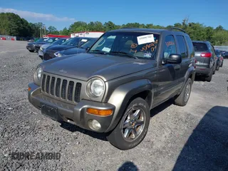 2003 Jeep Liberty Limited with VIN 1J4GL58K33W584981, listed as a IAAI auction lot 42808780 with 137,710 mi miles and . Bid and sale history available at DreamBid. Image 2.