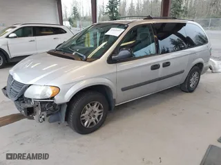 2005 Dodge Caravan SE with VIN 1D4GP24R85B351591, listed as a IAAI auction lot 41949337 with 130,821 mi miles. Bid and sale history available at carsss.com. Image 2.