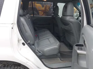 2004 Honda Pilot EX with VIN 2HKYF185X4H571558, listed as a IAAI auction lot 41901839 with 196,703 mi miles. Bid and sale history available at carsss.com. Image 8.