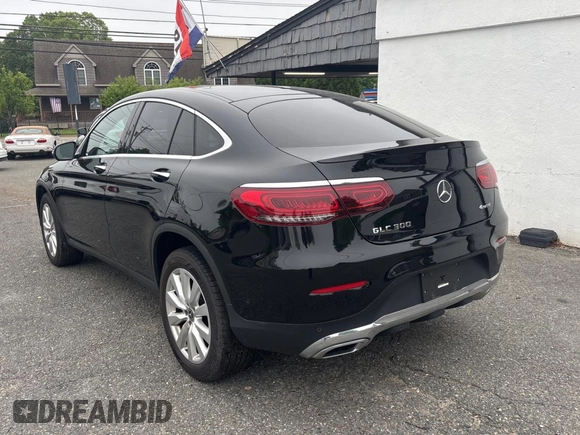 2021 Mercedes-Benz GLC 300 z VIN W1N0J8EB2MF904451, wystawiony jako Copart lot #57702365 z przebiegiem 117 769 mil mil oraz Czysty tytuł • Clean title. Historia ofert i sprzedaży dostępna na DreamBid. Obrazek 3.